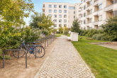 Innenhof - Wohnen im begehrten Maximilians Quartier: Moderne 2-Zimmer Wohnung mit Balkon & TG-Stellplatz