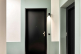 Wohnungseingang - Wohnen im begehrten Maximilians Quartier: Moderne 2-Zimmer Wohnung mit Balkon & TG-Stellplatz