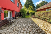 Terrassenbereich Rückseite - Mehrgenerationen-Traum: Zweifamilienhaus nahe Baumschulenweg mit Entwicklungsbedarf und Potenzial!