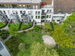 Familienfreundliches Zuhause: 5-Zimmer-Eigentumswohnung mit Balkon & Tiefgaragenstellplatz - Luftaufnahme