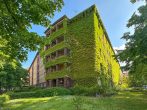 Stilvolles Wohnen mit Townhouse-Flair: Maisonette-Wohnung mit Loggia dicht am Rüdesheimer Platz - Wohnanlage