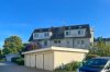 Gepflegte 3-Zimmer-Wohnung mit Sonnenbalkon & Blick in die Natur Großbeerens - Garage/ Wohngebäude